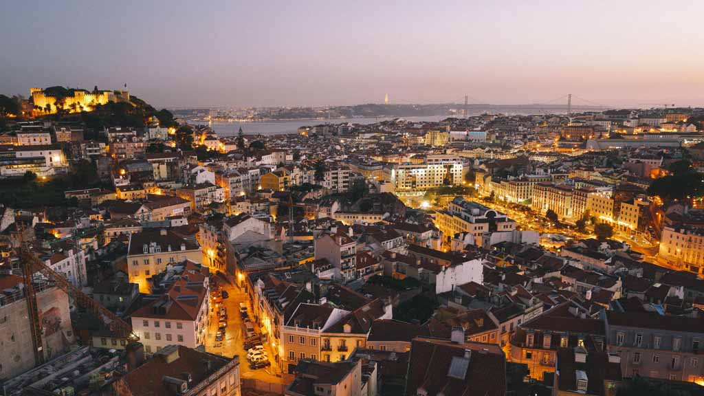 Lisbon at night for a fitness holiday with city energy